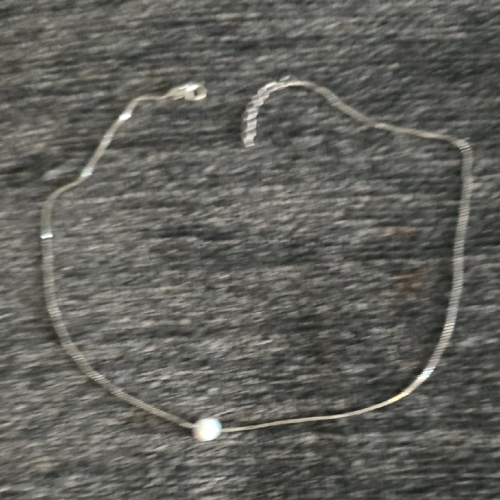 Silver and White Necklace with Elegant Design